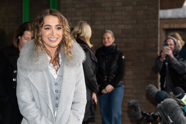 Georgia Harrison outside court after Stephen Bear was jailed for sharing a private video of them (PA)