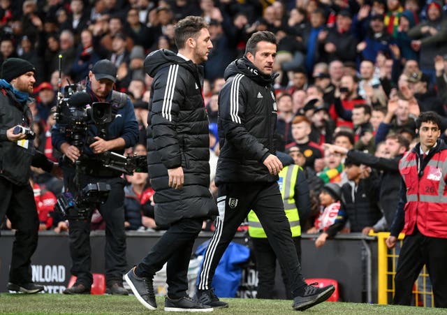 <p>Marco Silva leaves the pitch after being sent off at Manchester United </p>