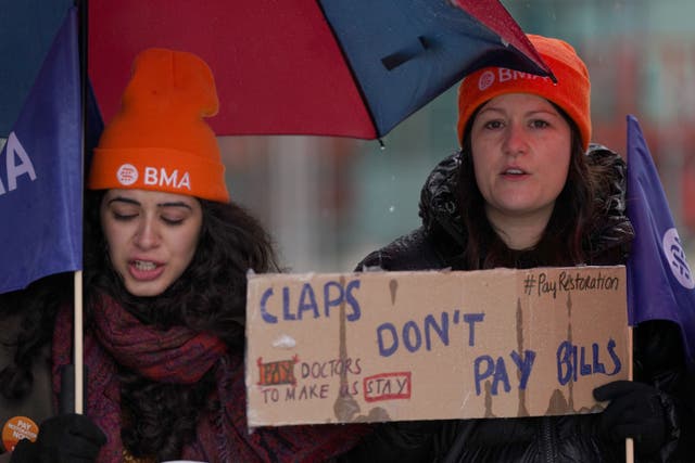 Striking NHS junior doctors on the picket line (PA)