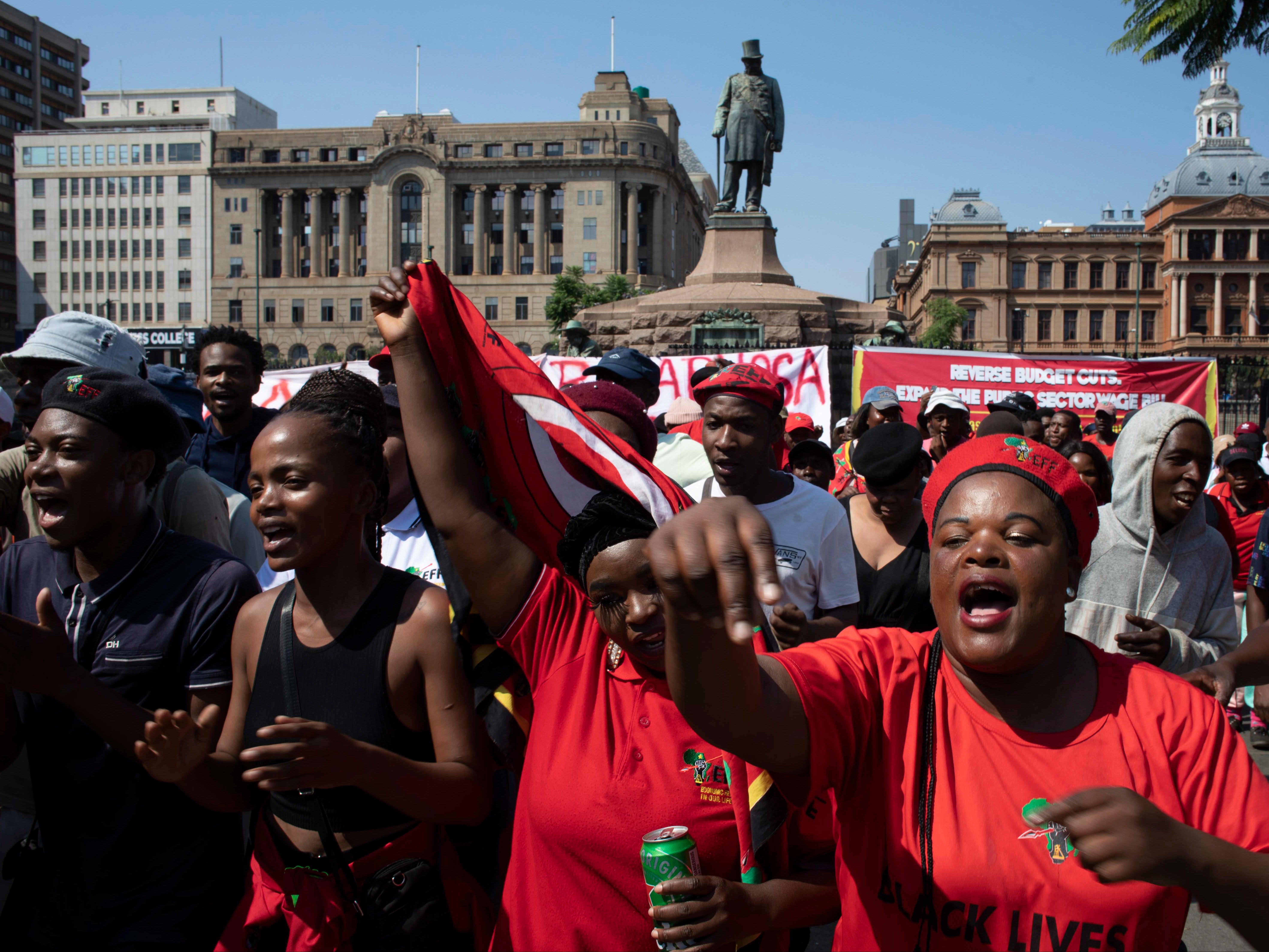 <p>Supporters of leftist political party the Economic Freedom Fighters (EFF) protest in Church Square in Pretoria, South Africa, on 20 March 2023</p>