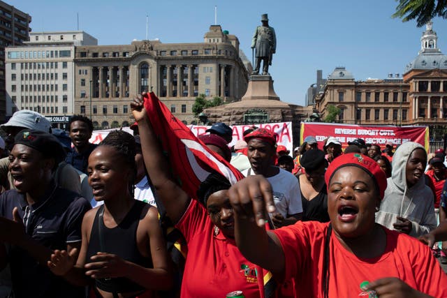 <p>Supporters of leftist political party the Economic Freedom Fighters (EFF) protest in Church Square in Pretoria, South Africa, on 20 March 2023</p>