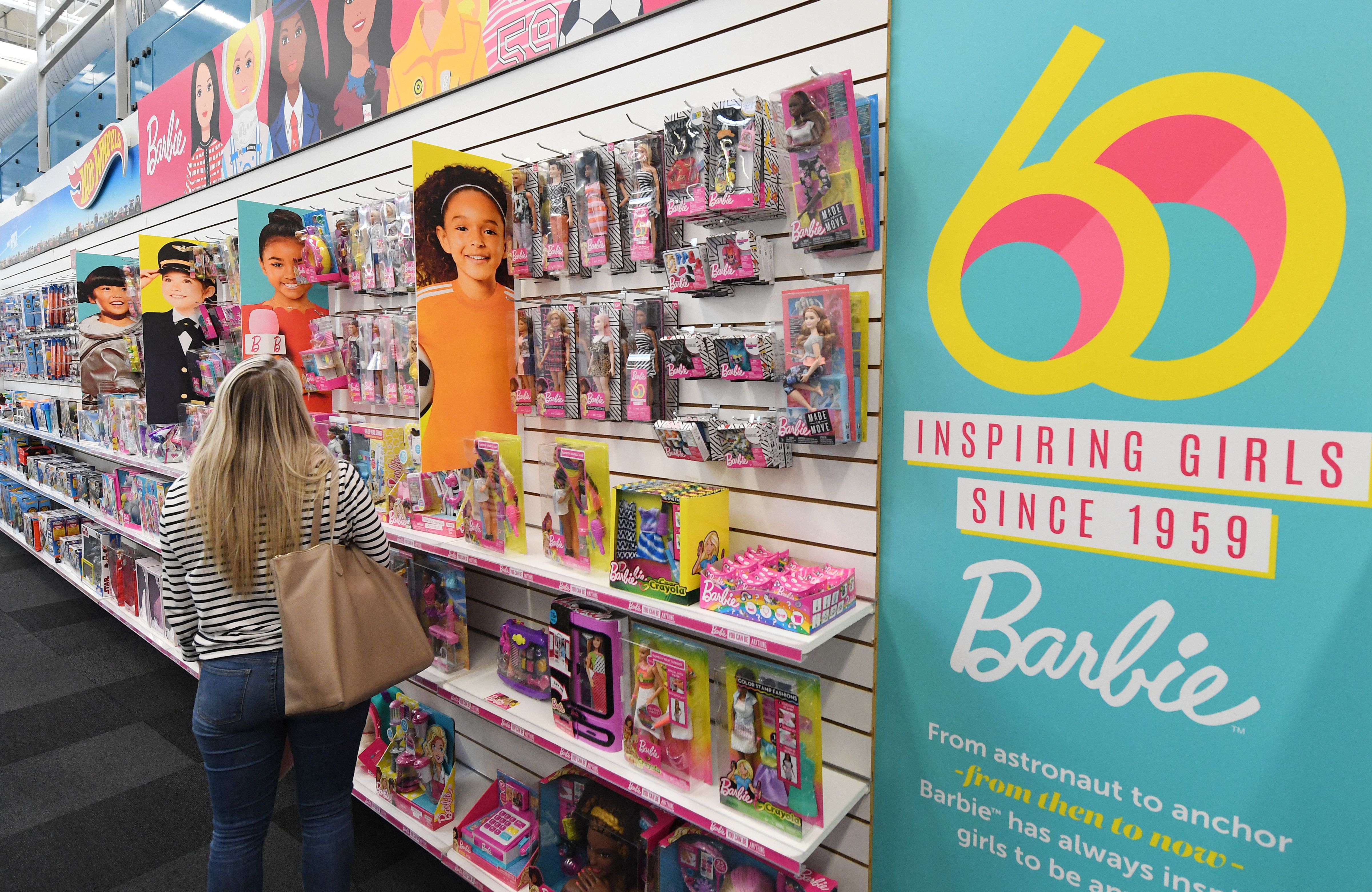 Barbie dolls are displayed at a workshop in the Mattel design center as the iconic doll turns 60