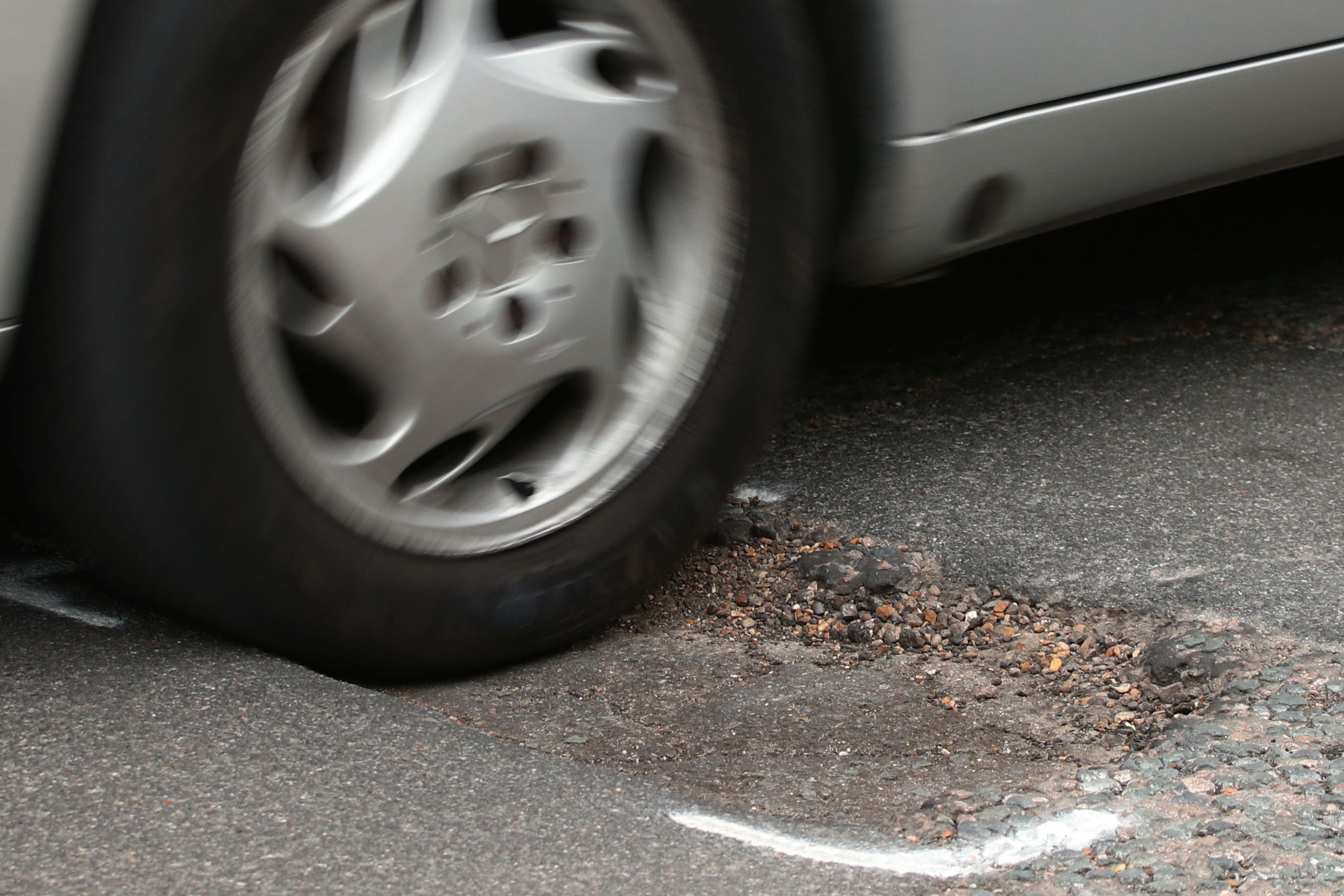 Shortfalls in pothole repair budgets among local authorities have reached a record high, according to research (Yui Mok/PA)