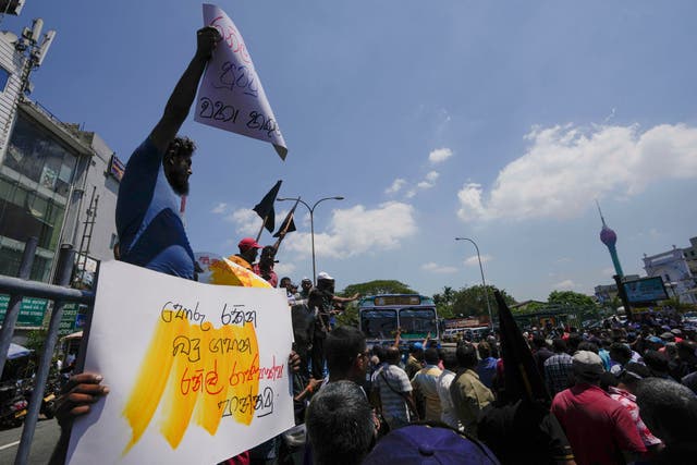 <p>File photo: Sri Lankans shout slogans during a protest against the government increasing income tax to manage day to day expenses </p>