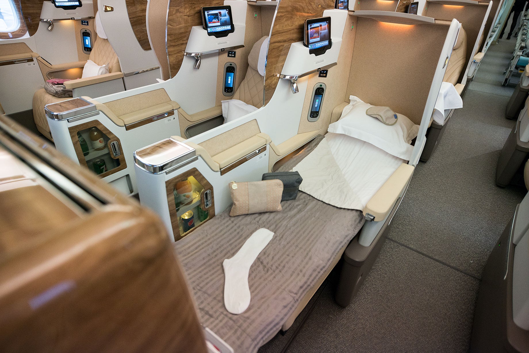 A picture of an Emirates Boeing 777-300 ER business class cabin