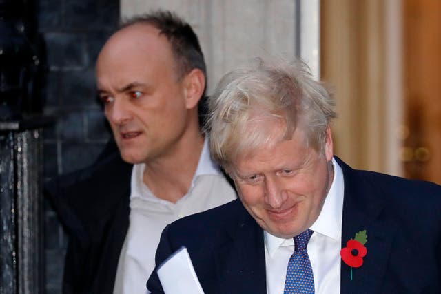 <p>Johnson and Cummings leave 10 Downing Street in October 2019</p>