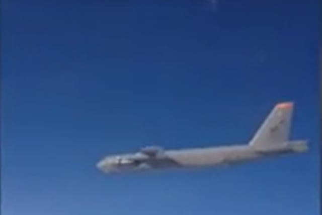 <p>Footage released on Tuesday, purportedly captured from a Russian Su-35, showed one of two American aircrafts flying above the clouds</p>