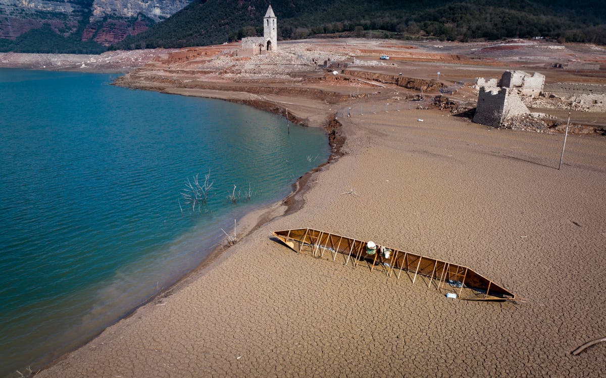 Ghost village appears out of reservoir in Spain as country hit by drought