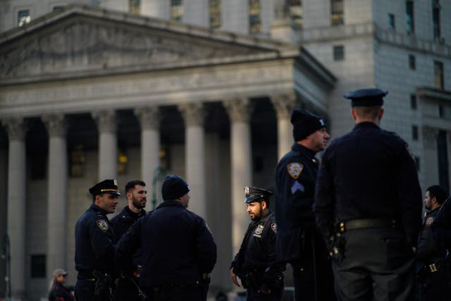 <p>Police officers near New York’s courthouse complex </p>