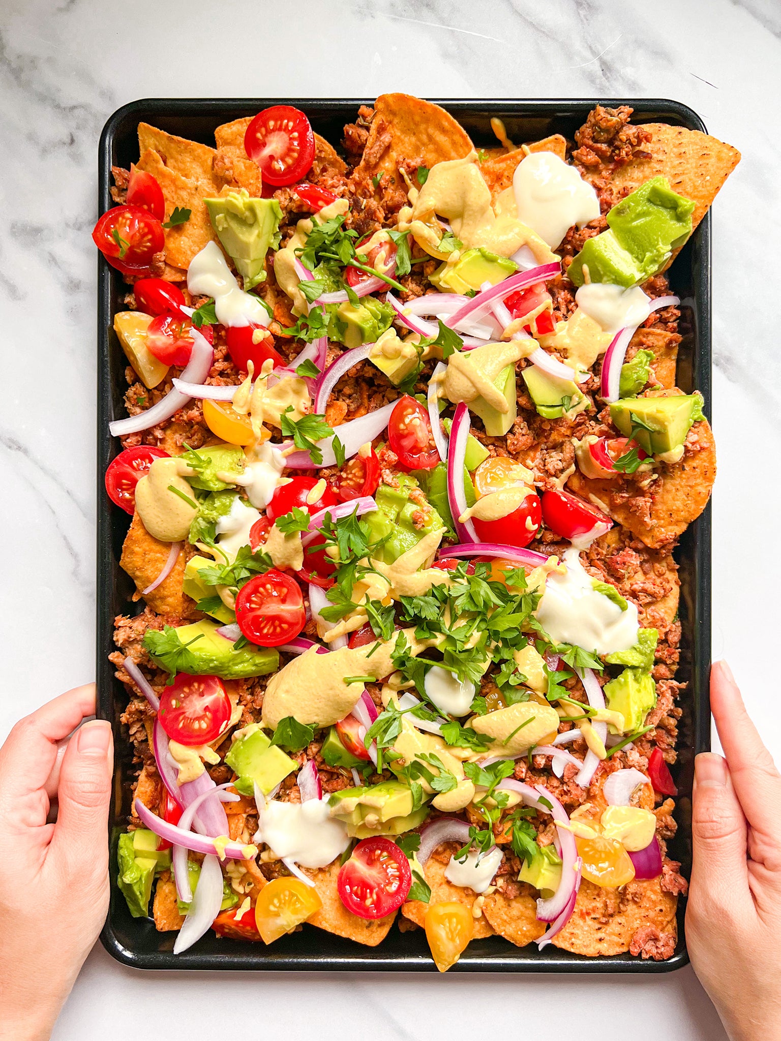 Saturdays are for indulgence, and these plant-based loaded nachos are just that