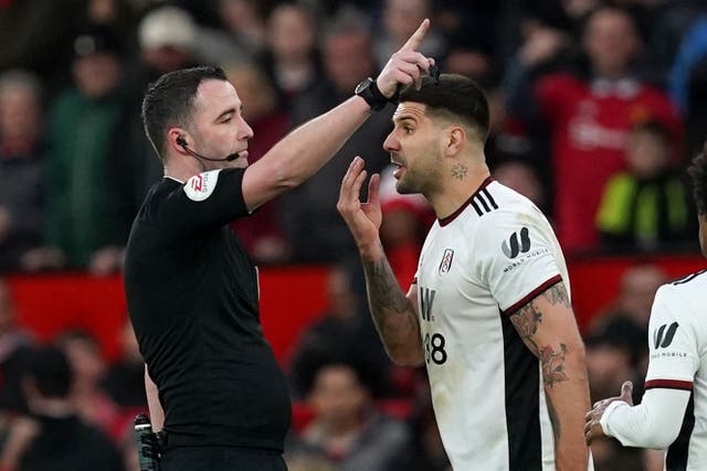 Aleksandar Mitrovic was sent off after he pushed referee Chris Kavanagh during Fulham’s defeat to Manchester United (Martin Rickett/PA)