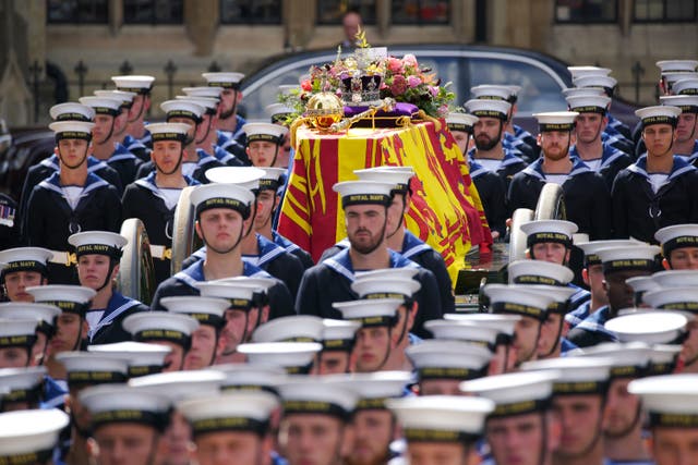 The coffin of Queen Elizabeth II being carried by pallbearers leaving the State Funeral held at Westminster Abbey, London (Peter Byrne/PA)