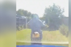 Road rage driver’s dashcam films him knocking motorcyclist off bike after 50mph chase