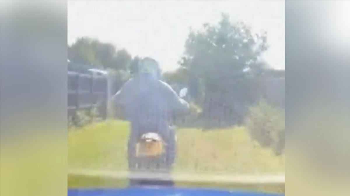Road rage driver’s dashcam films him knocking motorcyclist off bike after 50mph chase