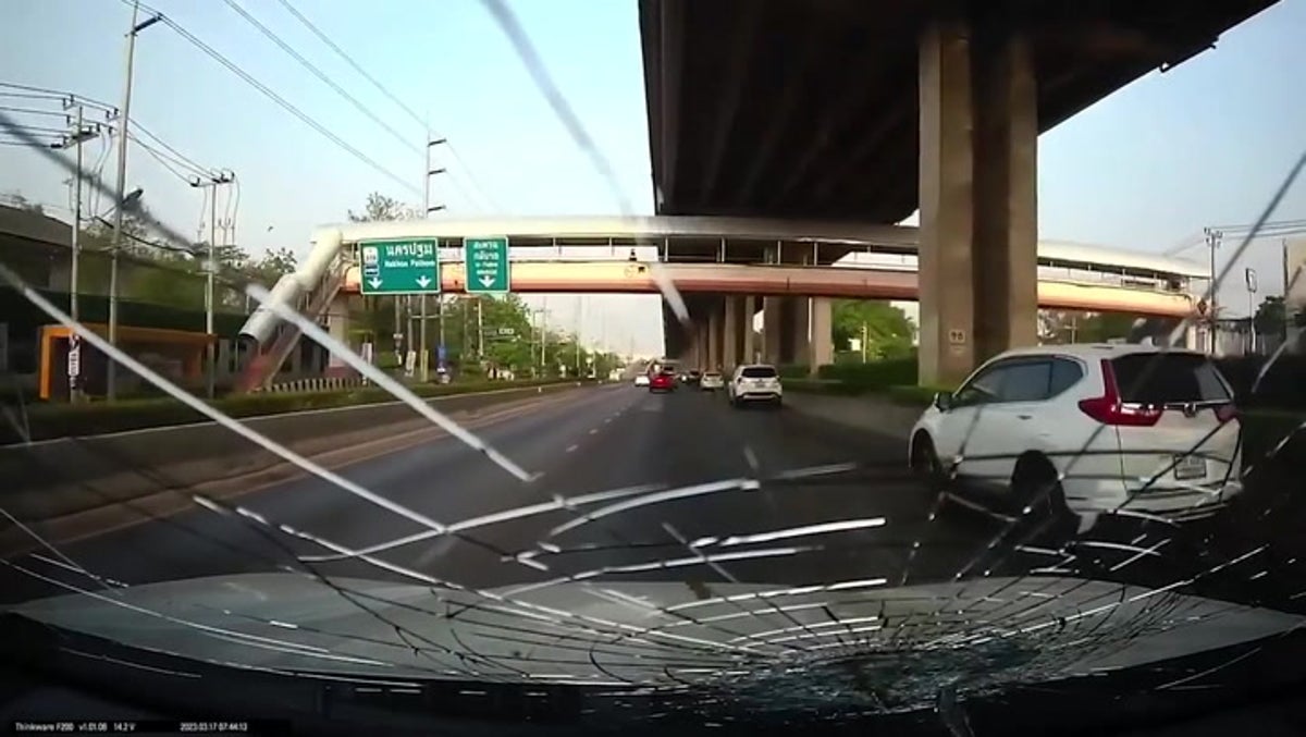 Moment screw shatters car windscreen after falling from a flyover