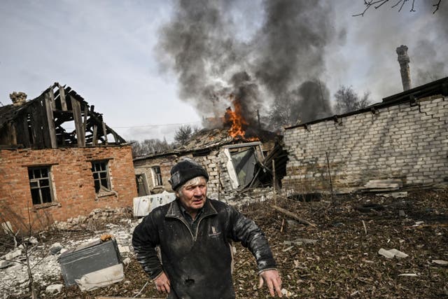 <p>A burning house after Russian shelling in Chasiv Yar, near Bakhmut, on Tuesday</p>