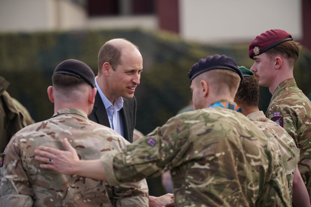 Prince William thanks British troops for &lsquo;defending freedom&rsquo; on surprise trip to Poland