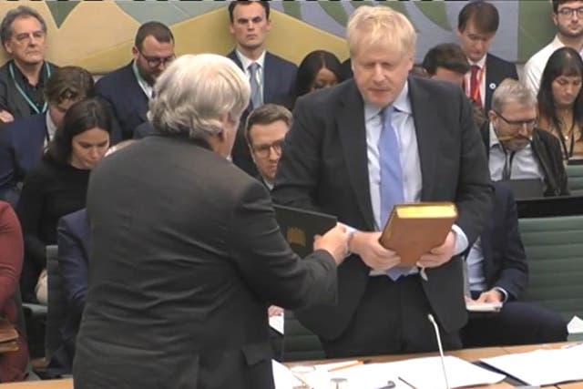 Boris Johnson takes the oath (House of Commons/PA)