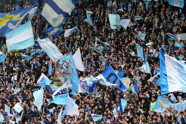 <p>Three Lazio supporters are set to be banned for life after their behaviour during the Rome derby </p>