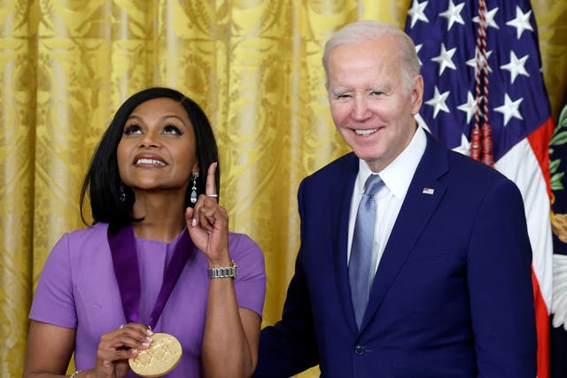 <p> U.S. President Joe Biden awards actress Mindy Kaling a 2021 National Medal of Art during a ceremony in the East Room of the White House on March 21, 2023</p>