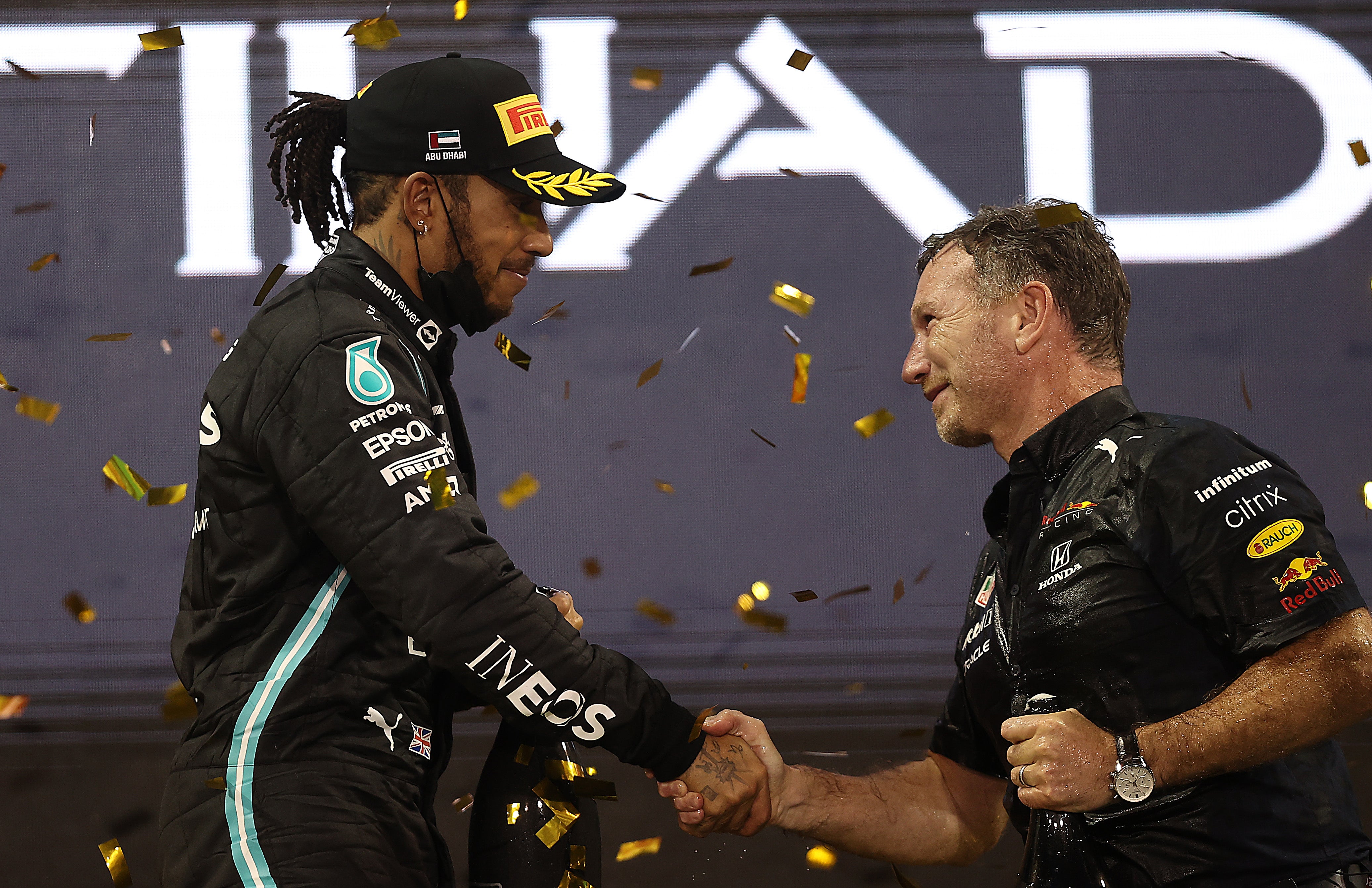 Lewis Hamilton with Christian Horner, who he says is ‘stirring things’ about a potential move to Red Bull