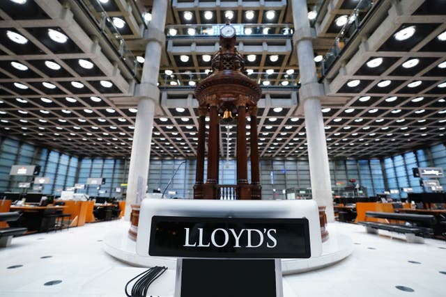 The Lutine Bell on the underwriting floor of the Lloyd’s Building in London (Ian West/PA)