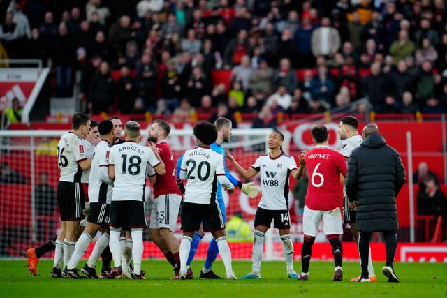 Manchester United have been charged by the FA after their players surrounded referee Chris Kavanagh against Fulham (Jon Super/AP)