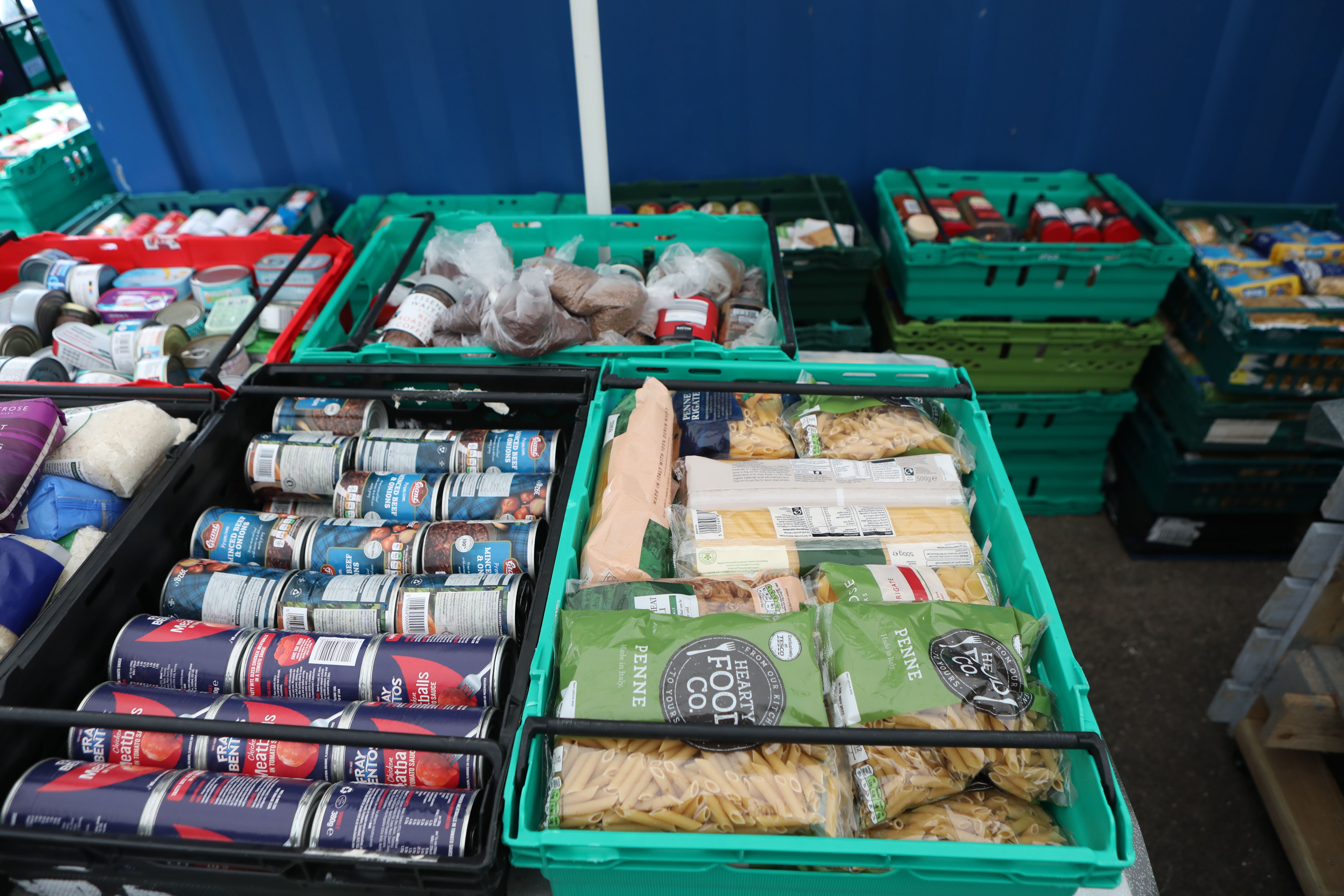 Food laid out in crates at a food bank (PA)