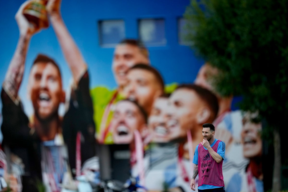 Messi mania grips Argentina in 1st match as World Cup champs