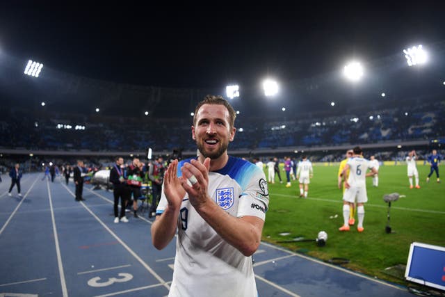 <p>Harry Kane applauds England fans after the victory in Naples</p>