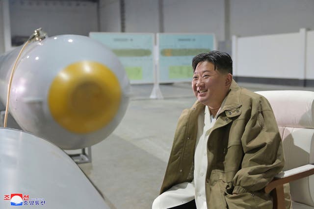<p>In this undated photo provided by the North Korean government, North Korean leader Kim Jong Un inspects what it says is the new unmanned underwater nuclear attack craft ‘Haeil’ </p>