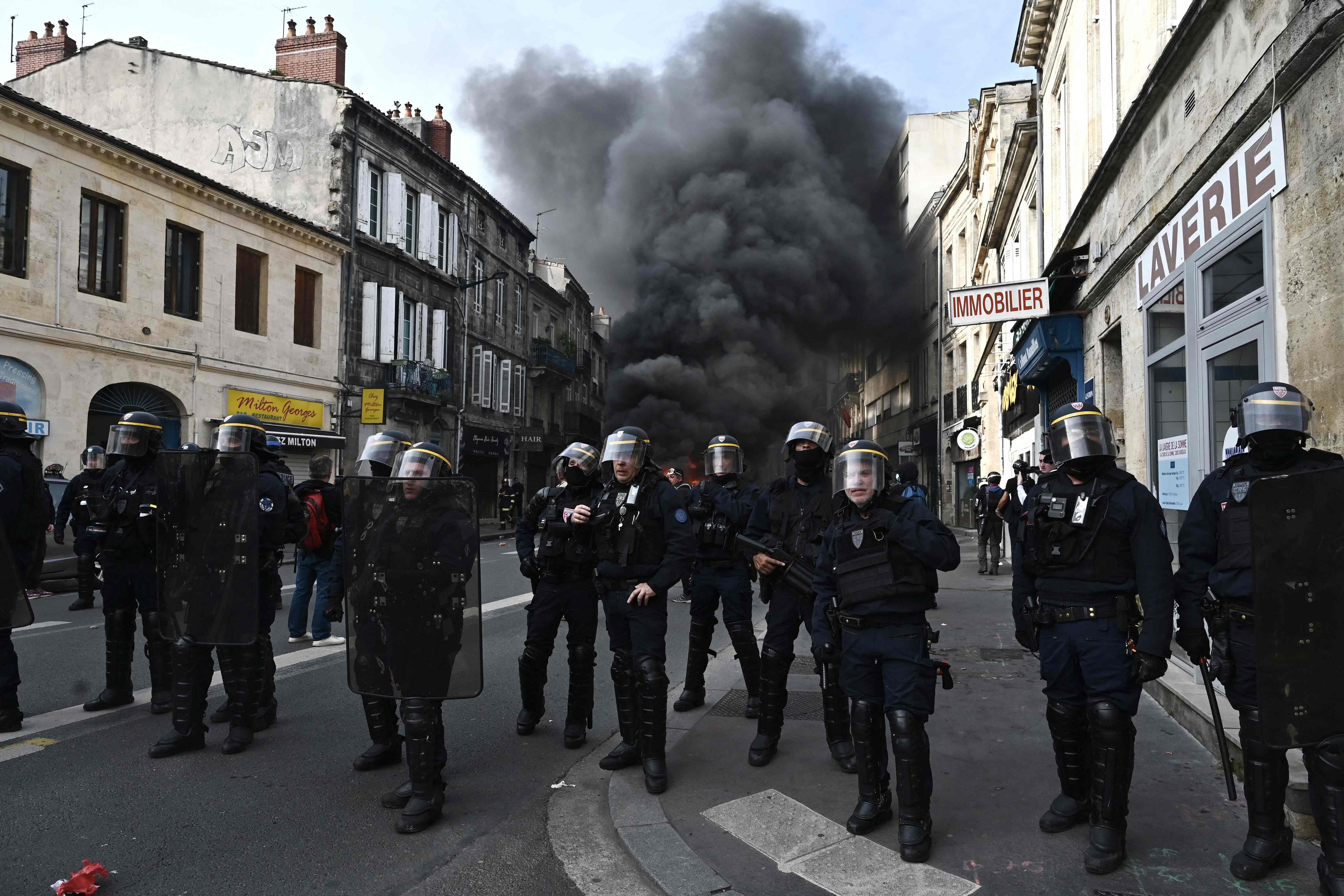 French Republican Security Corps officers faced down retirement protesters on Friday