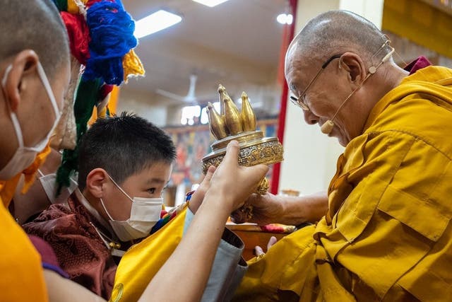 <p>An eight-year-old boy is recognised as the tenth Khalkha Jetsun Dhampa Rinpoche by the Dalai Lama in a ceremony in Dharamshala in Himachal Pradesh, India, on 8 March 2023 </p>