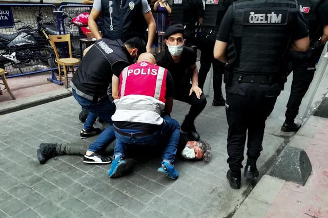 <p>Bulent Kilic being arrested while covering the Pride march in Istanbul on 26 June, 2021</p>