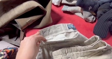The family’s clothes were available to buy – including this pair of pants with Buster’s name written on the tag
