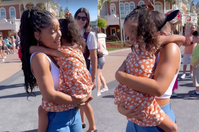 <p>Little girl refuses to let go of Ariel actress Halle Bailey after they meet at Disney World</p>