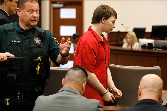 <p>Aiden Fucci is led into the courtroom start his sentencing hearing, Friday, March 24, 2023. in St. Augustine, Florida</p>