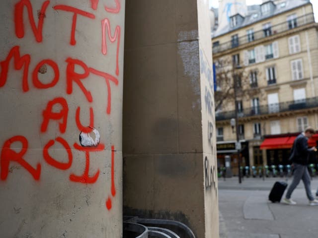 <p>‘Death to the King’ graffiti left by rioters in Paris</p>