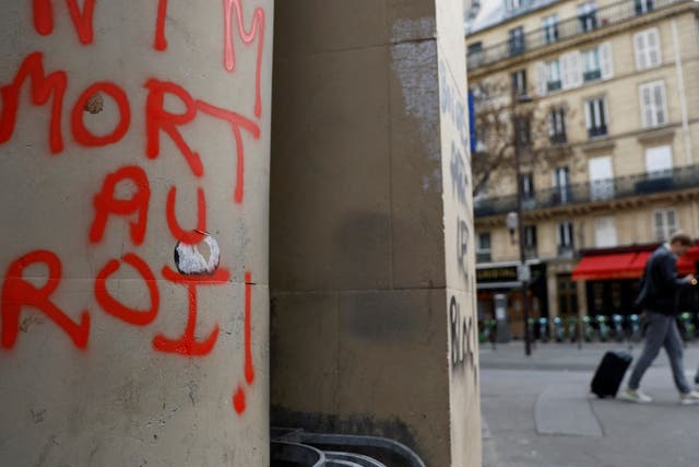 <p>‘Death to the King’ graffiti left by rioters in Paris</p>