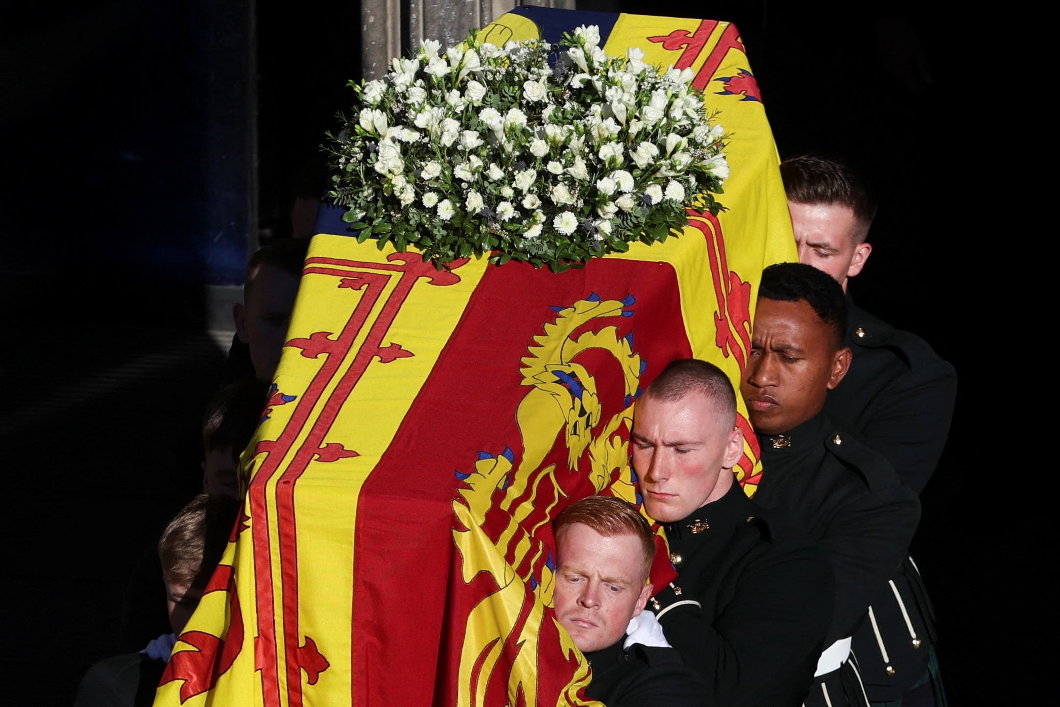 Pallbearers carry the coffin of Queen Elizabeth II as it departs St Giles’ Cathedral