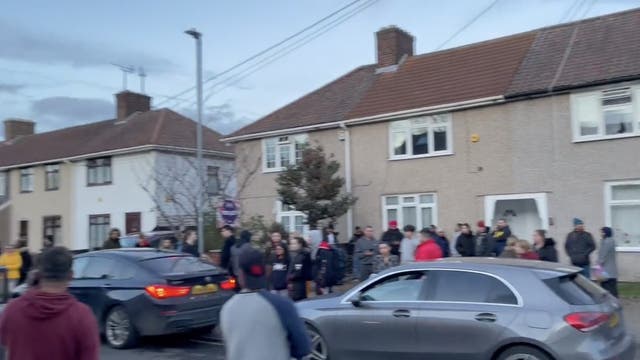 <p>Dozens of people queue down street to view two-bedroom house in East London</p>