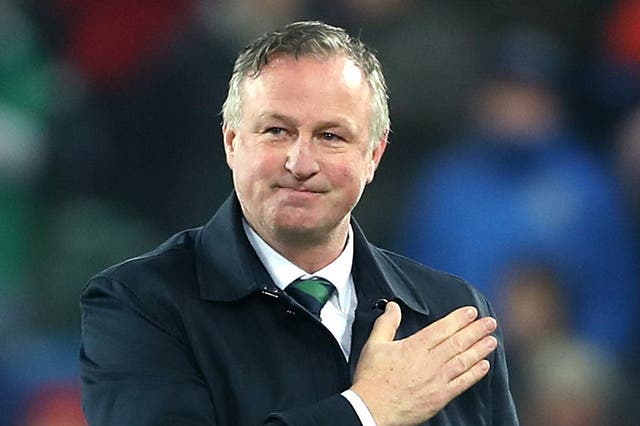 Michael O’Neill will walk out in front of the Northern Ireland fans at Windsor Park again on Sunday night (Liam McBurney/PA)