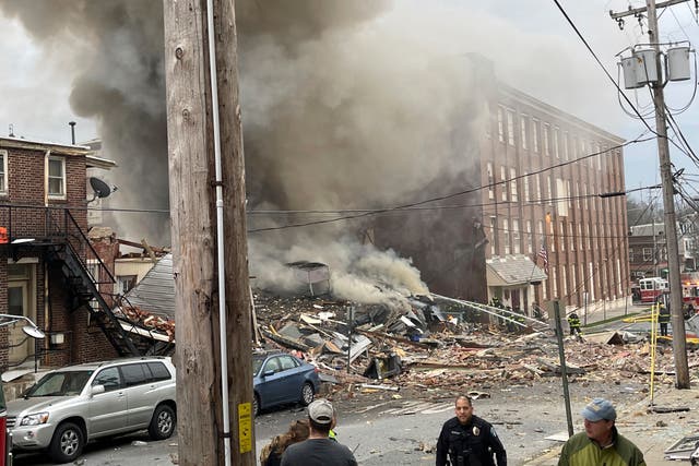 <p>Emergency personnel work at the site of a deadly explosion at a chocolate factory in West Reading, Pa., on March 24, 2023</p>