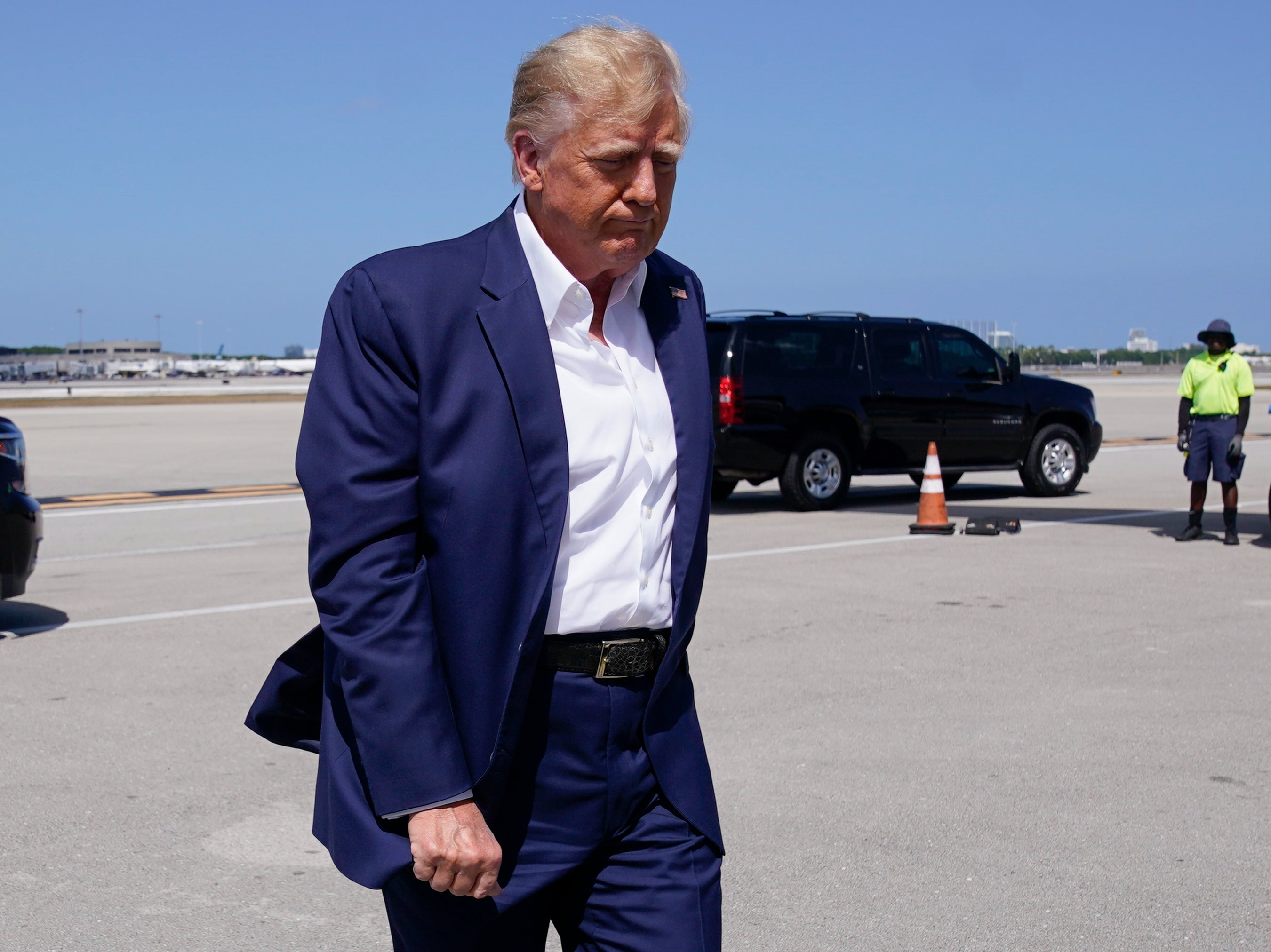 Trump pictured boarding his plane in Florida before flying to Waco