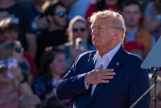 <p>Former U.S. President Donald Trump holds his hand over his heart during a 2024 campaign rally in Waco, Texas, March 25, 2023</p>