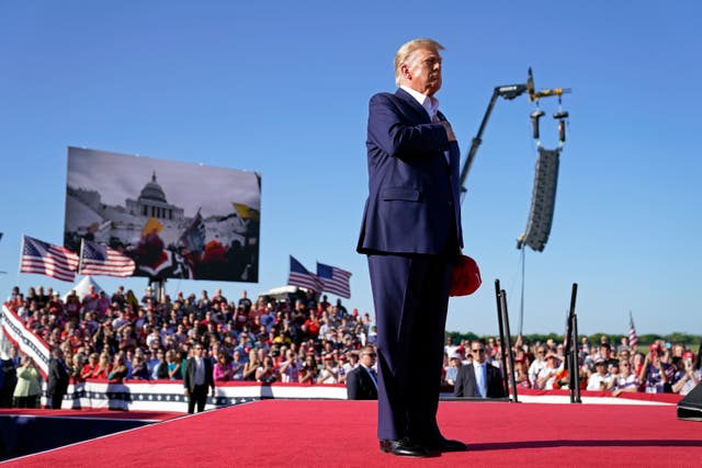 <p>Trump 'dangerously' starts rally with song featuring himself and imprisoned January 6 rioters</p>