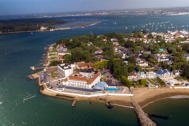 <p>The Sandbanks peninsula, which crosses the mouth of Poole Harbour on the south coast of England is known for its high property values and sandy beaches. </p>