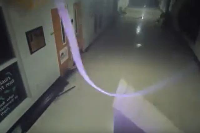 <p>Surveillance footage shows a tornado ripping through Amory High School just before 11pm on Friday 24 March 2023</p>