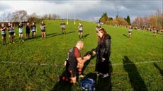 Rugby player feigns injury to surprise girlfriend with proposal