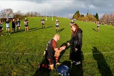 Rugby player feigns injury to surprise girlfriend with proposal